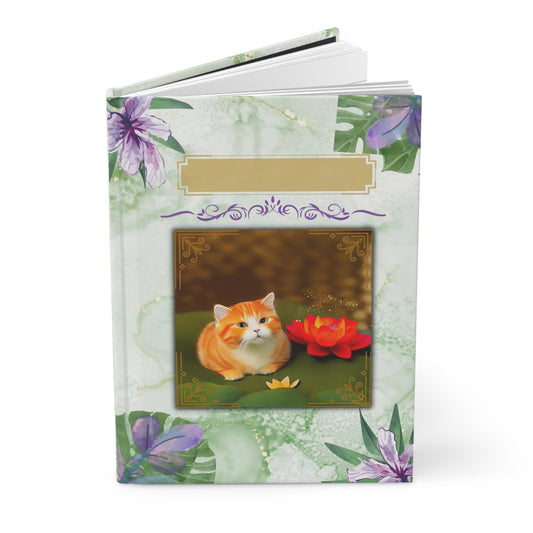 Divine Arts Hardcover Matte Journal Notebook Stationery Laminate Coating Ruled Line Orange Tabby Kitten Sitting Beside Pink and Yellow Lotuses in Decorative Picture Frame with Purple and Green Graphic Florals Framing the Front Cover